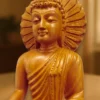 white wood meditating gautam buddha statue
